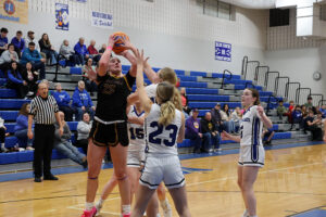Lady Warriors withstand Martinsville rally to secure road win