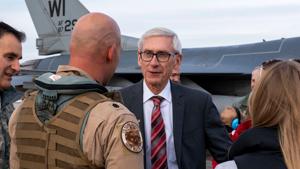 Evers vetoes bills to exempt overtime, cash tips from income tax