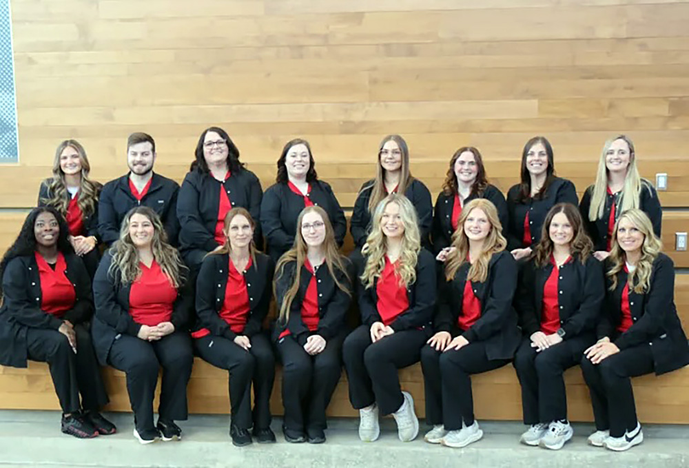 The Fall 2025 graduates of the Lake Land College LPN to ADN Bridge program.Pictured front row (from left to right): Minnie Gadison, Mattoon; Chelsea Munoz, Effingham; Rebecca Teal, Beecher City;¬¬¬ Medora Seibert, Mode; Aila-Jai Woomer, Effingham; Ella Shuler, Neoga; Stormy Judson, Casey; Brandy Watson, Beecher City. Pictured back row (from left to right): Ava King, Effingham; Paul Smith, Effingham; Michelle Fultz, Sullivan; Taylor Hall, Paris; Cassie Fancher, Mason; Jessica Williamson, Sullivan; Aimee Gooden, Charleston; Taylor Hawbaker, Shelbyville.