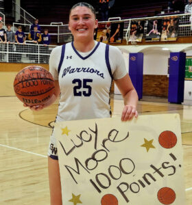 Milestone Moment: Moore hits 1,000th point in season opener